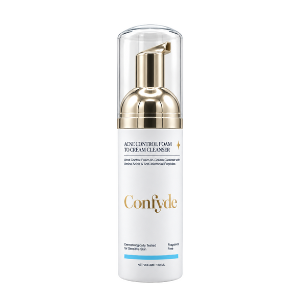 Confyde Acne Control Foam To Cream Cleanser in a 150 mL white pump bottle with a gold pump and clear cap, shown on a plain white background.